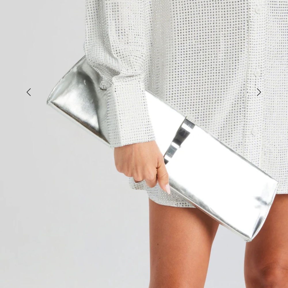 SOLD OUT ONLINE RETROFETE PURSE. Brand new with tag!!